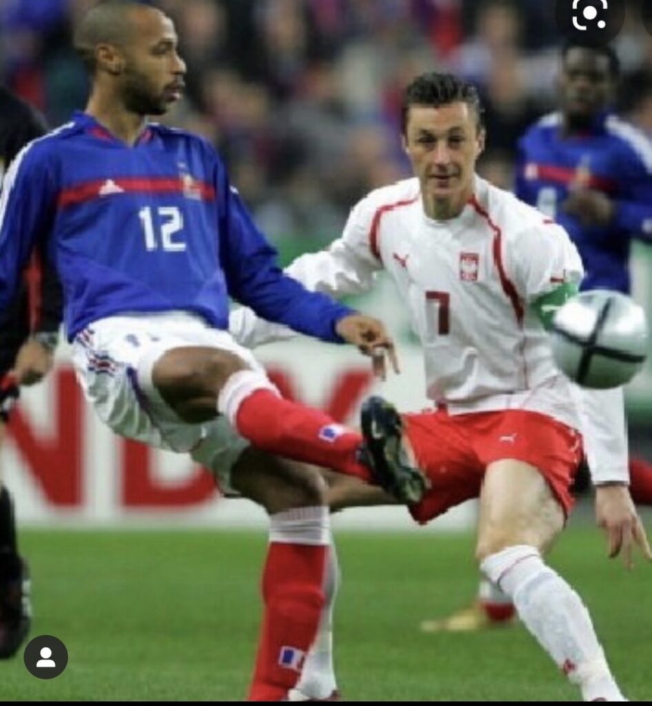 Tomasz Hajto i Thierry Henry.