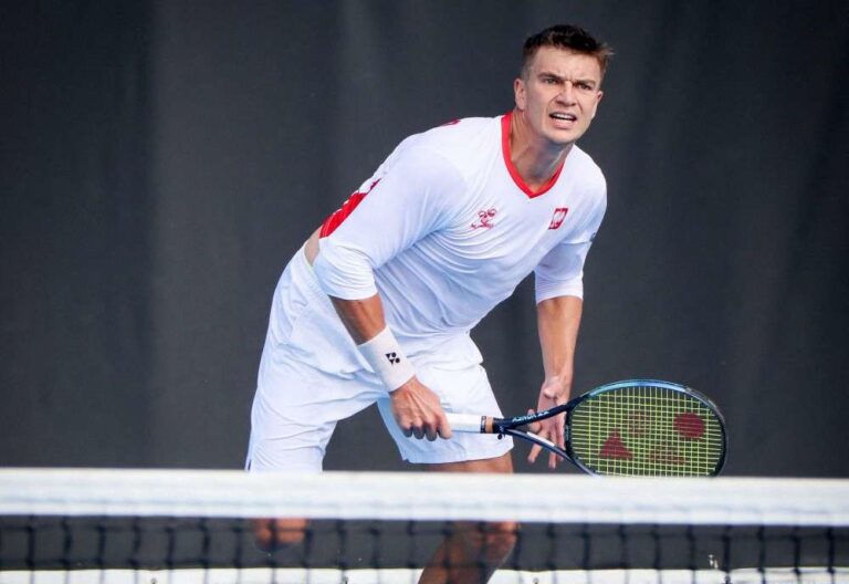 Karol Drzewiecki wystąpił w Wimbledonie wspólnie z Kamilem Majchrzakiem. Fot. Michał Jędrzejewski/PZT